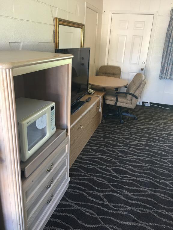 Budget Inn Motel Вудберн Экстерьер фото