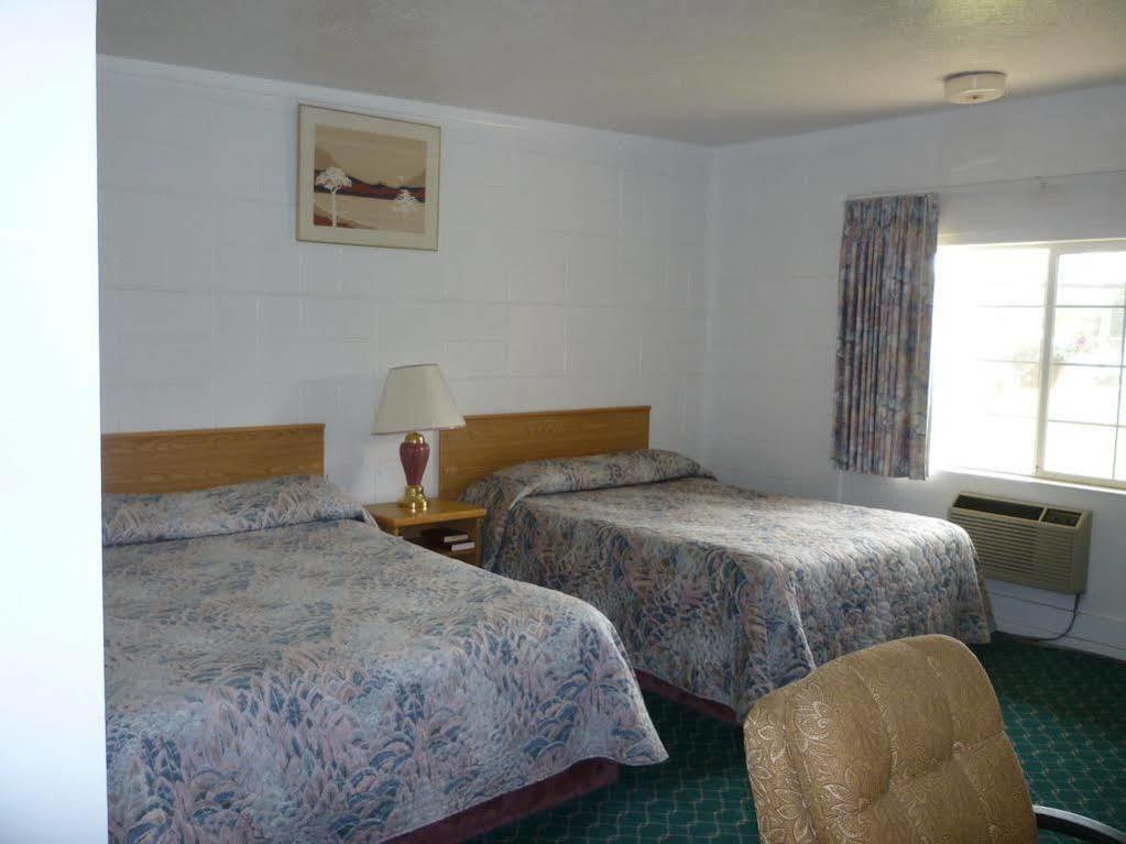 Budget Inn Motel Вудберн Экстерьер фото